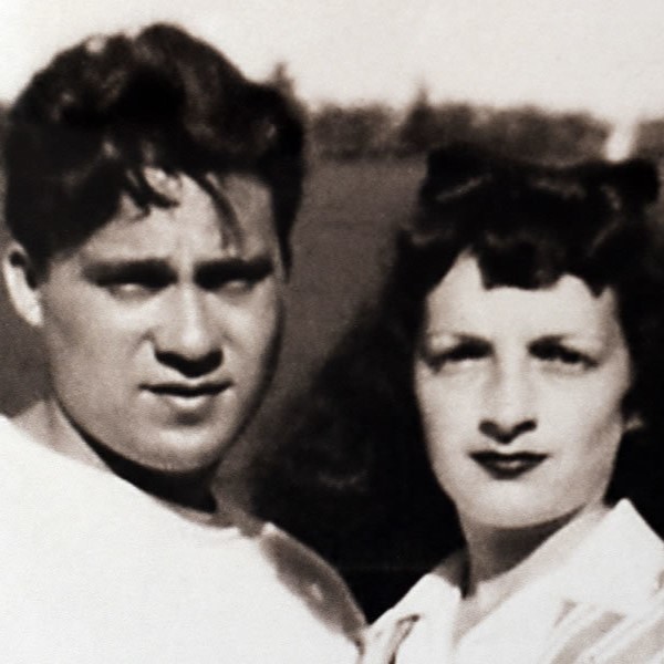 a black and white photo of a man and a woman